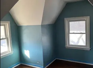 Exterior repaint and color refresh on suburban home